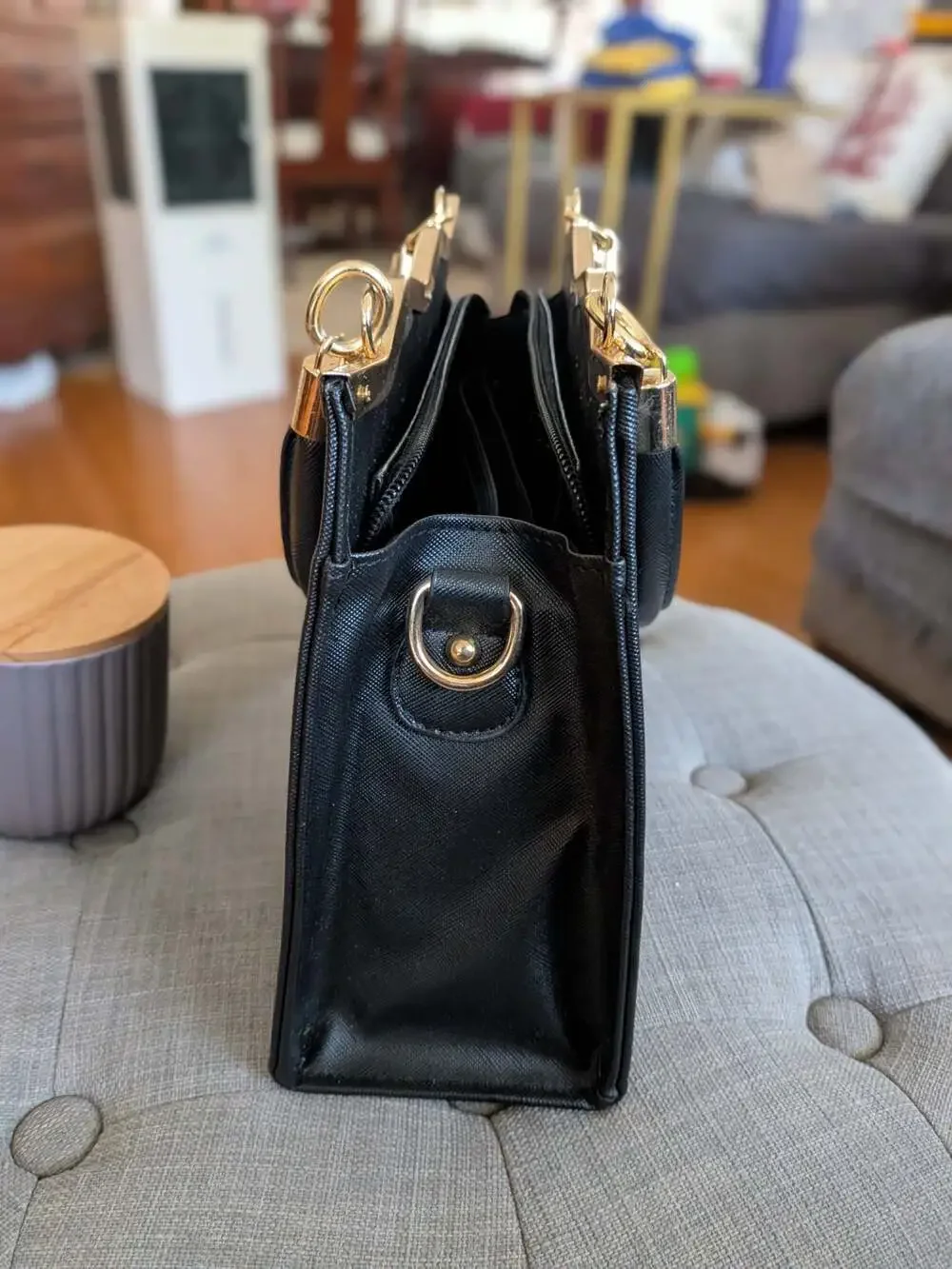 Black Saffiano Leather Handbag Satchel with Gold Bow Accent and Metal Trim